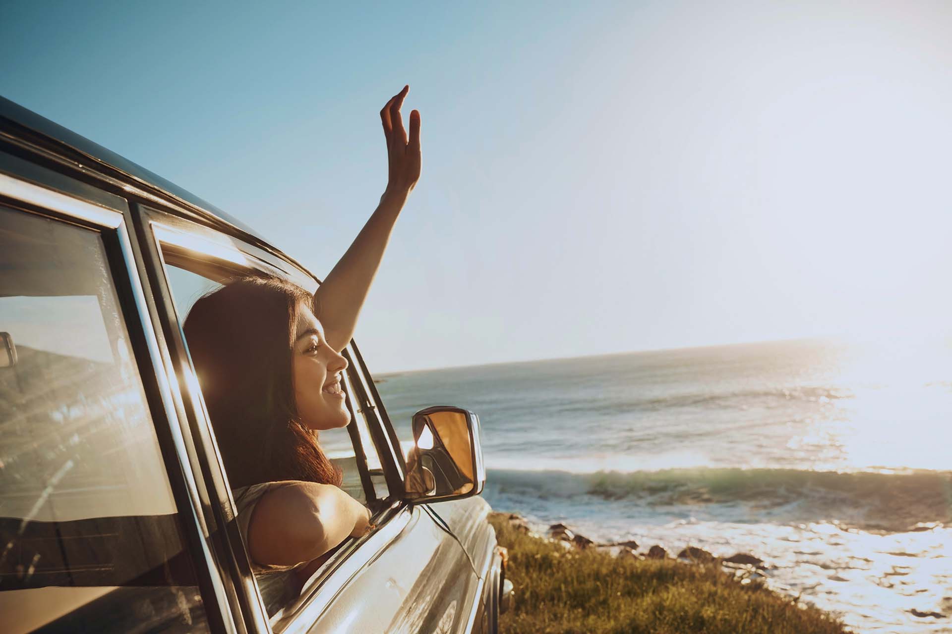 360 Car Rental Zakynthos girl in a car looking at the sea